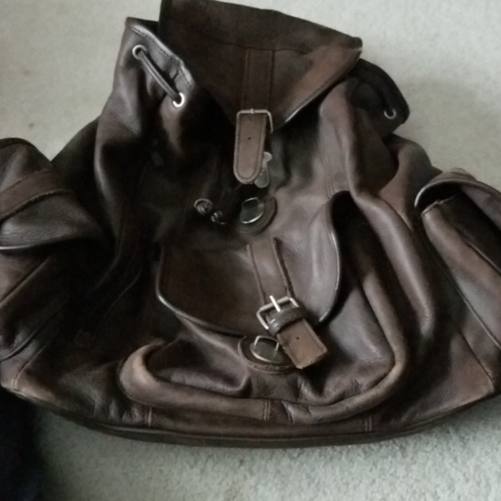 Leather multi pocket backpack